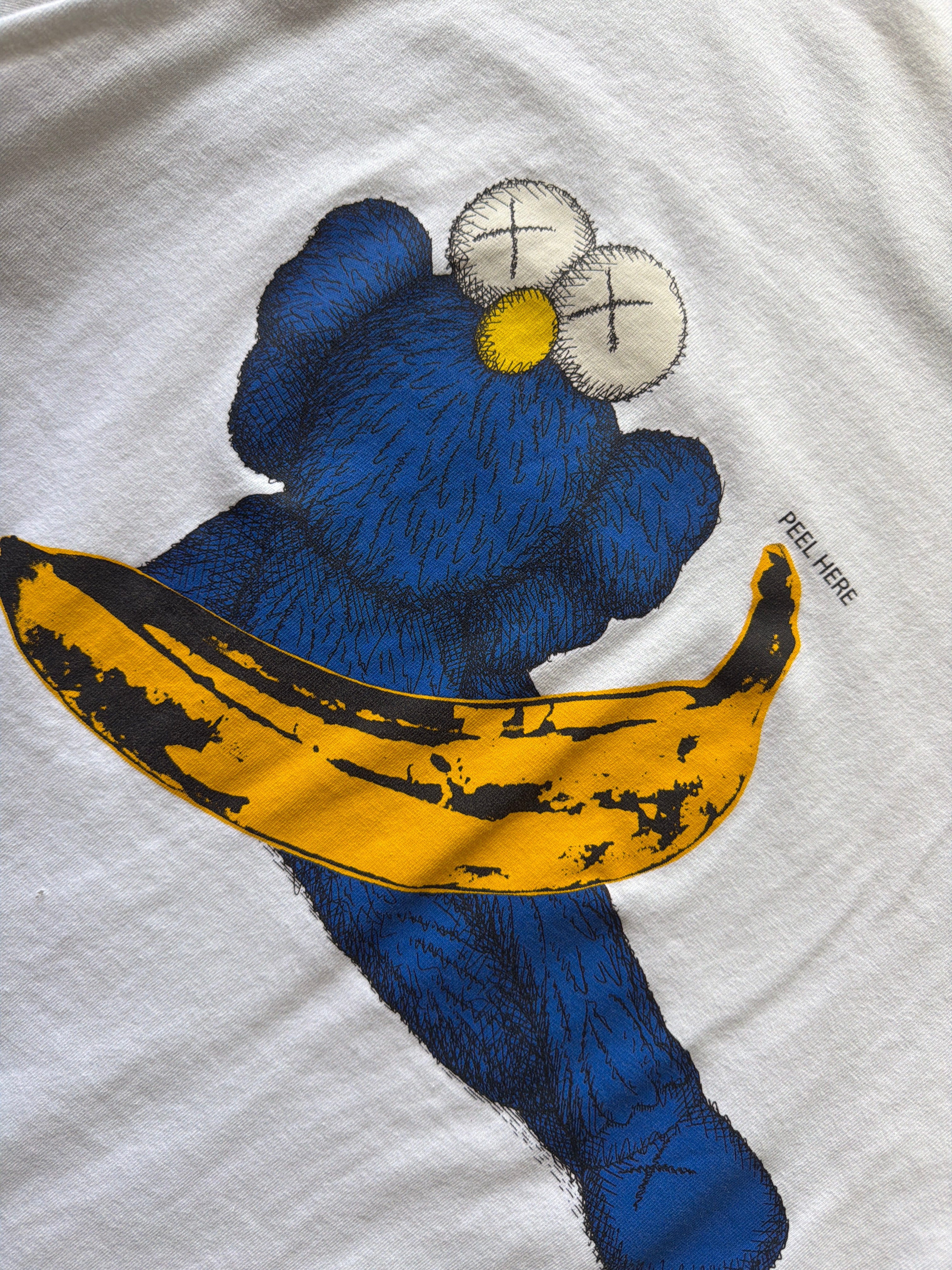 Uniqlo x Andy Warhol x Kaws Peel Here Tee
