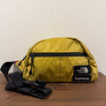 Supreme x The North Face Metallic Roo II Lumbar Pack Gold