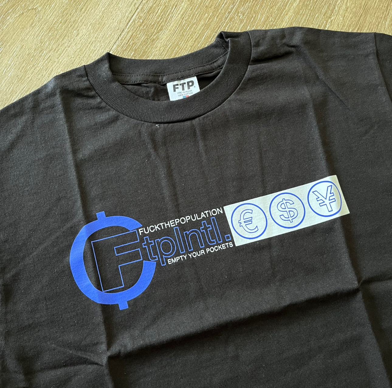 Fuck The Population Currency Tee