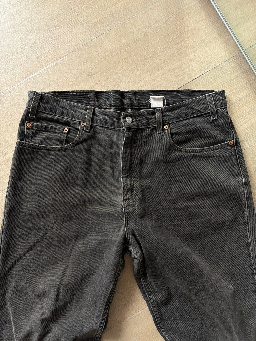 1990s Vintage Levis 550 Black Faded Jeans