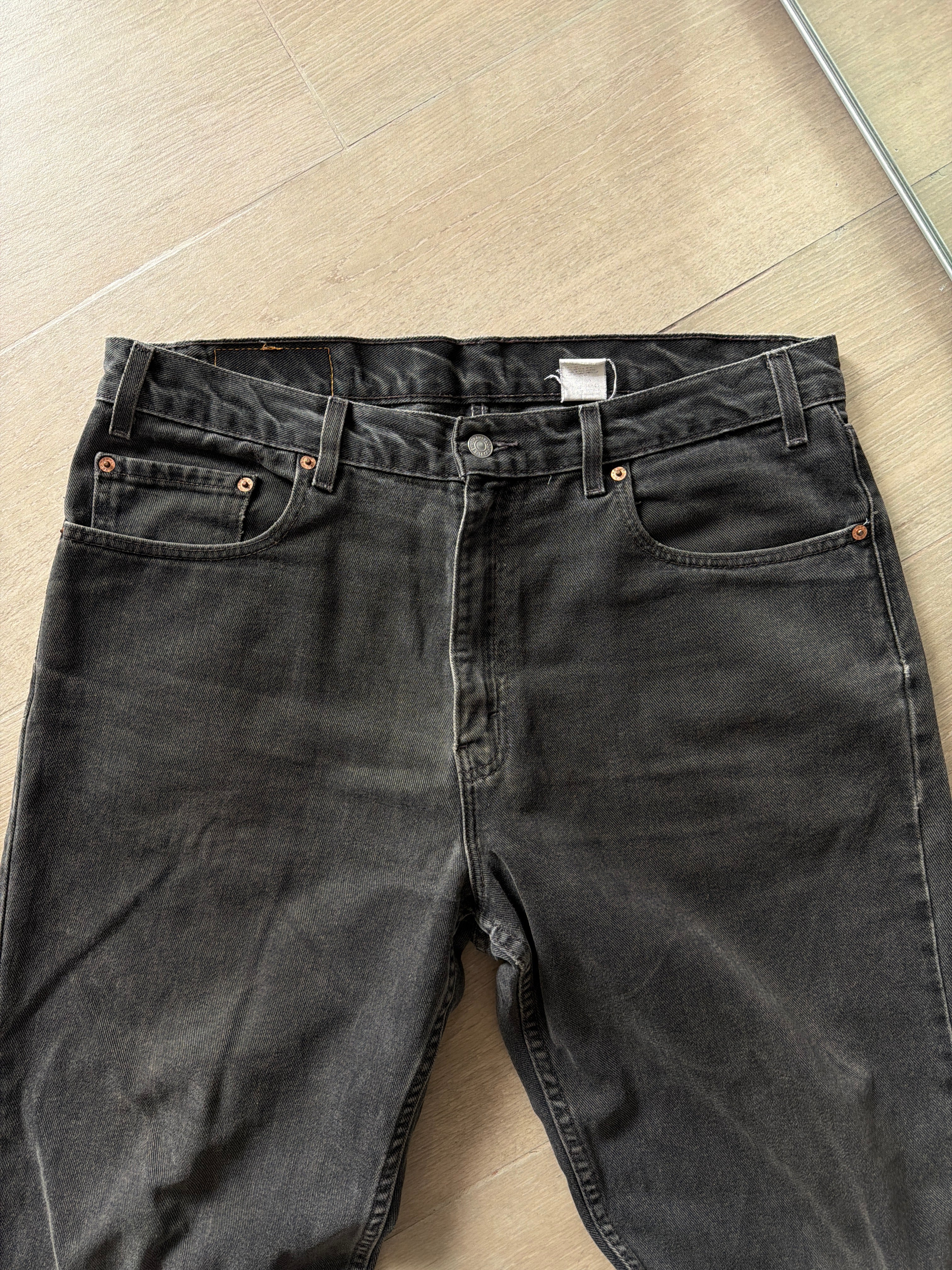 1990s Vintage Levis 550 Black Faded Jeans
