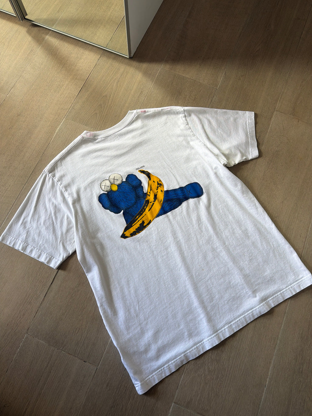 Uniqlo x Andy Warhol x Kaws Peel Here Tee