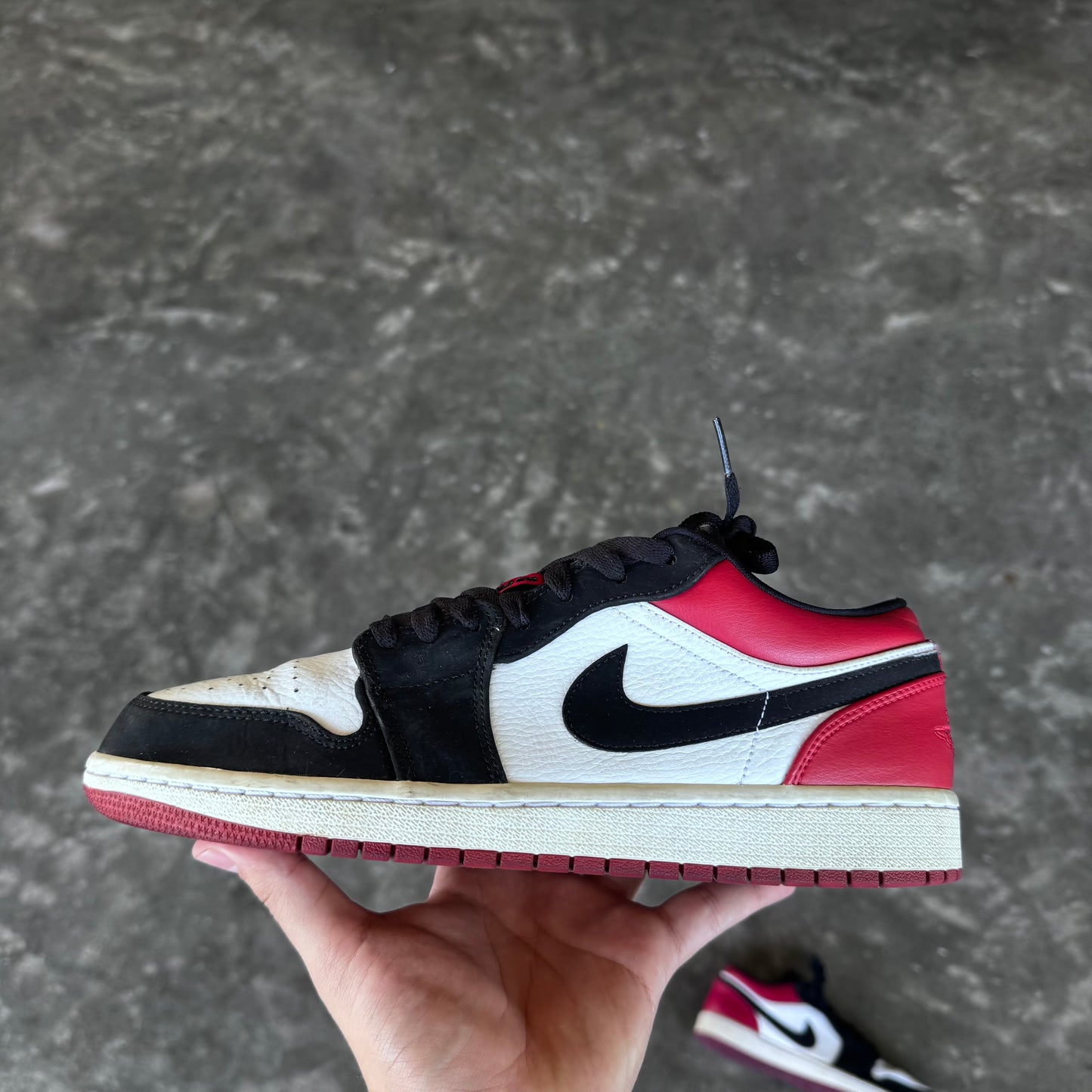 Jordan 1 Low Black Red