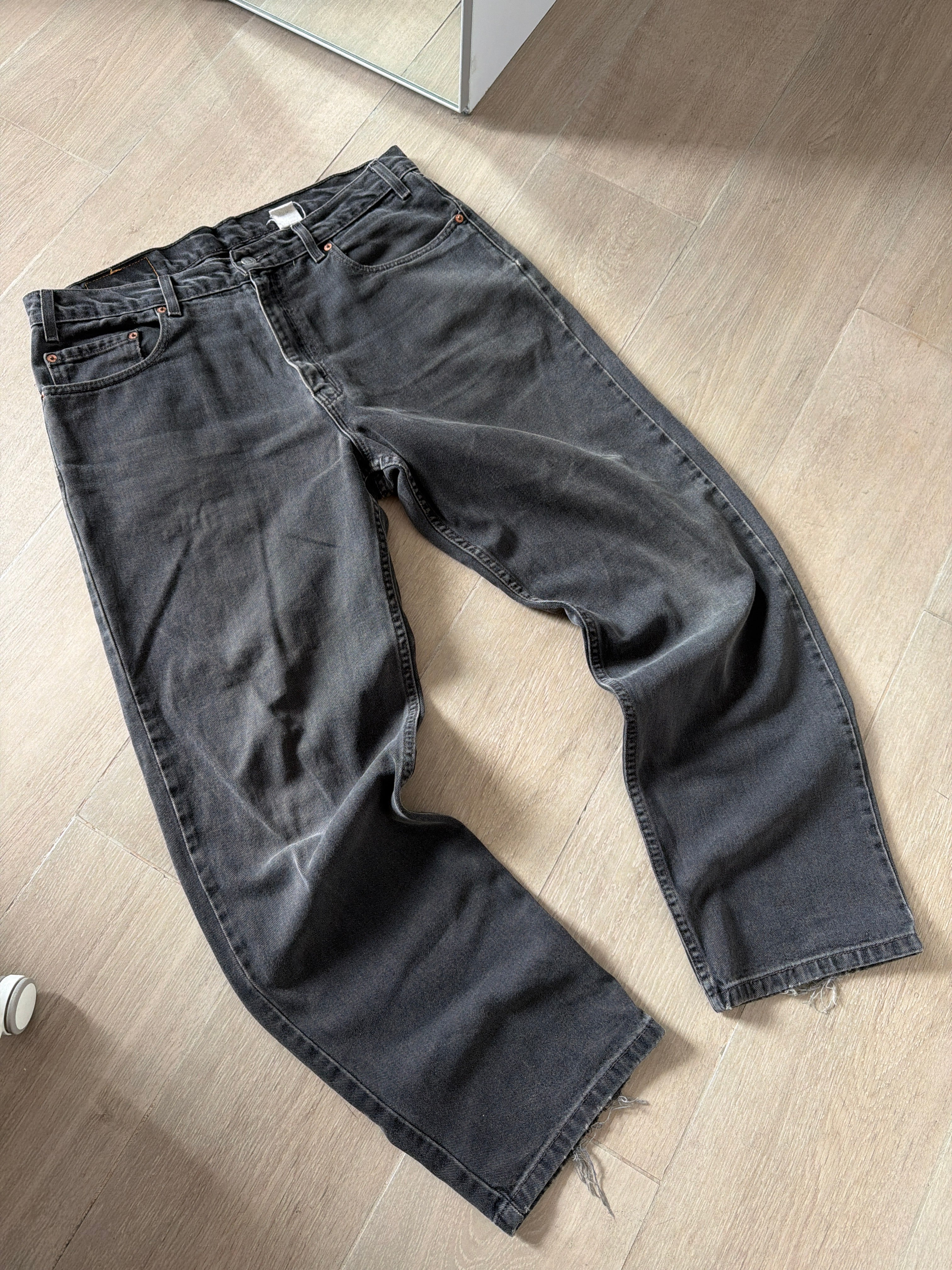 1990s Vintage Levis 550 Black Faded Jeans