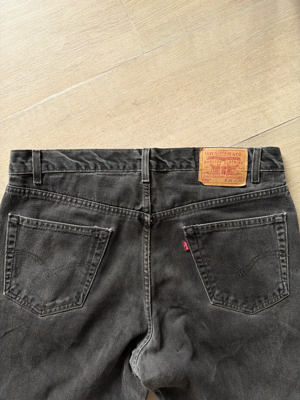 1990s Vintage Levis 550 Black Faded Jeans